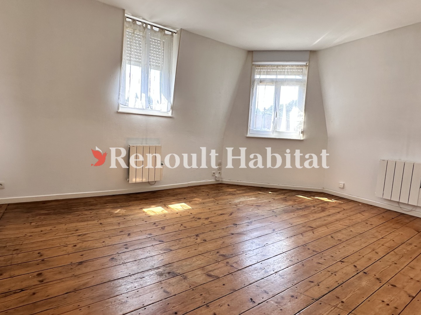 IMMEUBLE DIVISE EN 2 APPARTEMENTS VENDUS LOUES